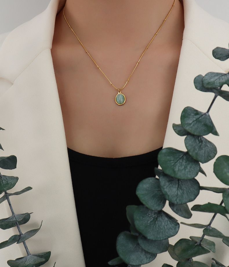 Collana da donna in acciaio al titanio con ciondolo ovale a forma di occhio di gatto placcato oro 18 carati, stile retrò francese elegante_voghion.com