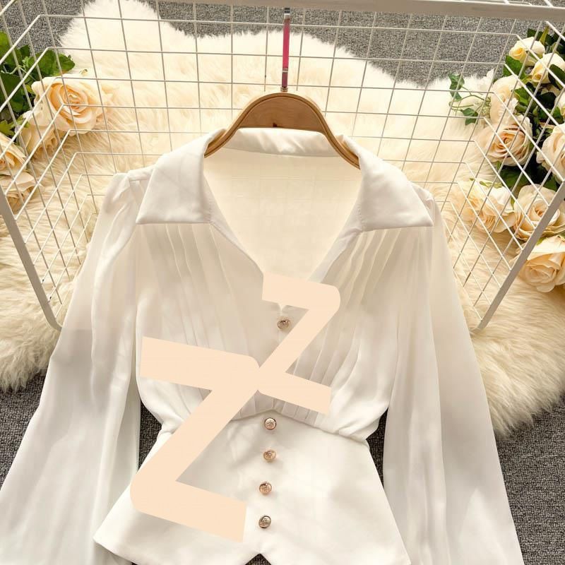 Camicia a maniche lunghe con colletto arricciato, design di nicchia per abbigliamento femminile, top con maniche a sbuffo e orlo irregolare per temperamento femminile_voghion.com