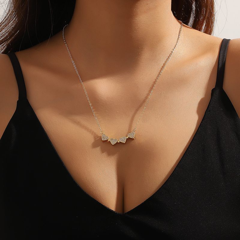 Compact Four-leaf Clover Fashion Magnetic Folding Heart Necklace Copper Micro-inlaid Electroplated Gold 4 Hearts_voghion.com