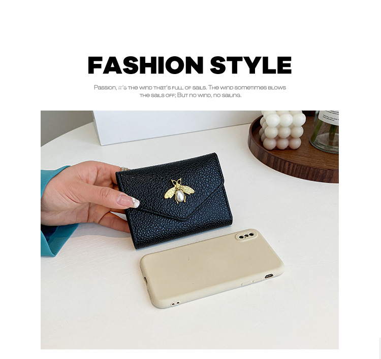 Cross-border small bee wallet female 2023 new short section small and thin section wallet 30% off niche solid color coin purse PU_voghion.com