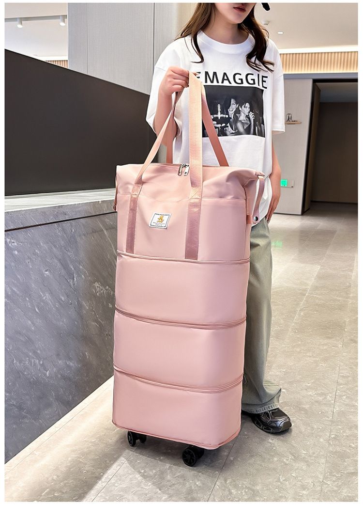 Travel bag with large capacity and universal wheels trips and waiting for delivery, waterproof three layer shrinkable and expandable luggage bag_voghion.com