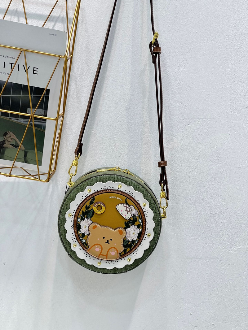 Borsa da donna, stampa vintage, borsa rotonda traforata, borsa a tracolla dal design di nicchia_voghion.com