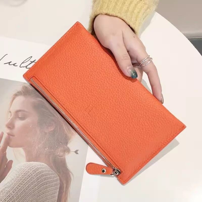 Echt leren lange dames ultradunne 2025 Koreaanse versie Nieuwe eenvoudige casual rits voor telefoon Zachte koeienhuid portemonnee_voghion.com