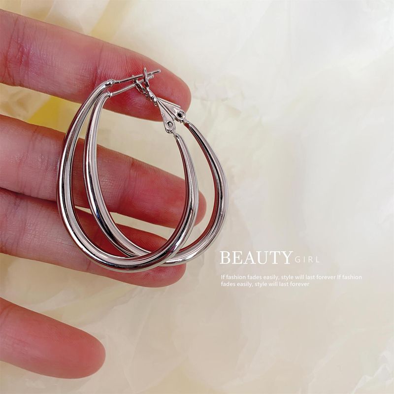Orecchini pendenti a cerchio in argento con perno ovale esagerato, grandi, in stile minimalista, per donna_voghion.com