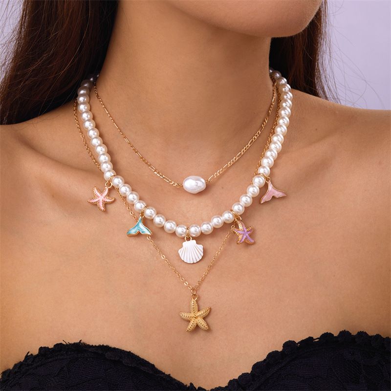 Ensemble de bijoux pour femme : collier multicouche en coquillage, perle et conque, style rétro estival, avec pendentif étoile de mer._voghion.com