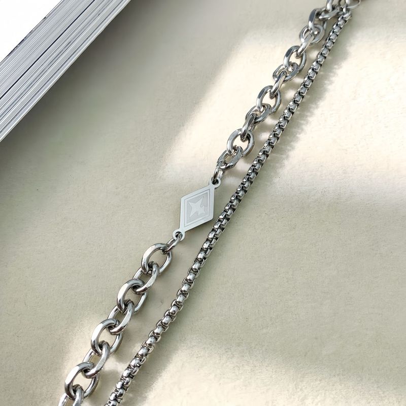 Bracciale da uomo cubano in acciaio al titanio leggero e lussuoso, a forma di diamante, 2025, design semplice e versatile, per coppie, da donna_voghion.com
