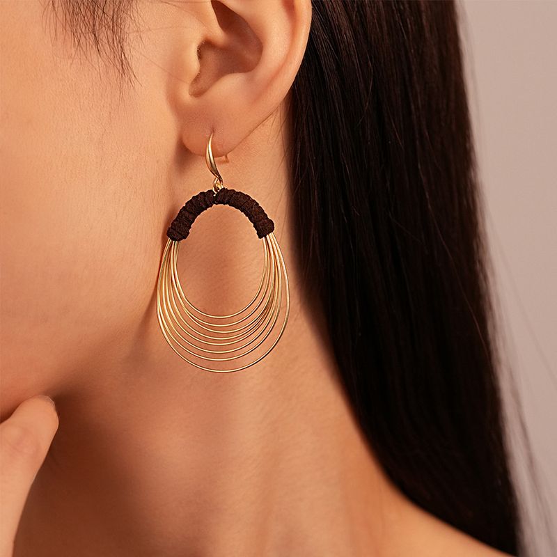 Exaggerated multi-layer circle ear hook personalized fabric winding geometric earrings_voghion.com