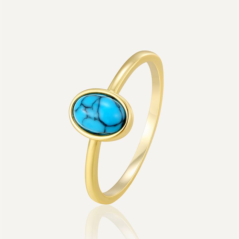 R0677 Anello in stile bohémien con turchese ovale intarsiato in oro per donna_voghion.com