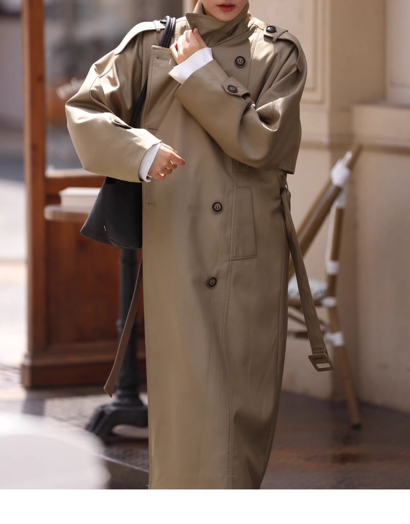 Trench classico doppiopetto da donna - Giacca sartoriale di media lunghezza con revers a lancia, silhouette strutturata e tasche funzionali_voghion.com