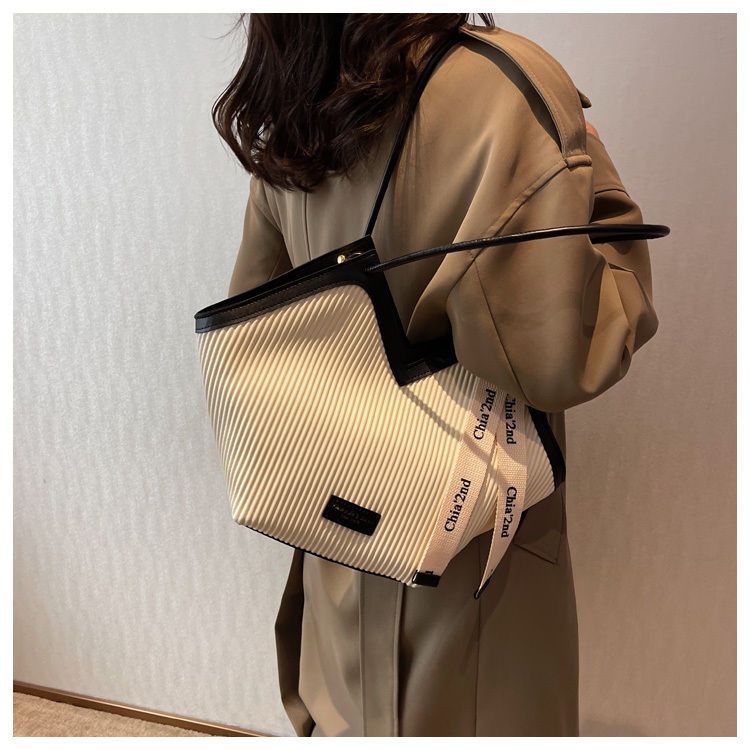 Borsa tote per studenti a spalla singola da pendolarismo in pelle versatile e casual da donna famosa su Internet del 2024 di grande capacità_voghion.com