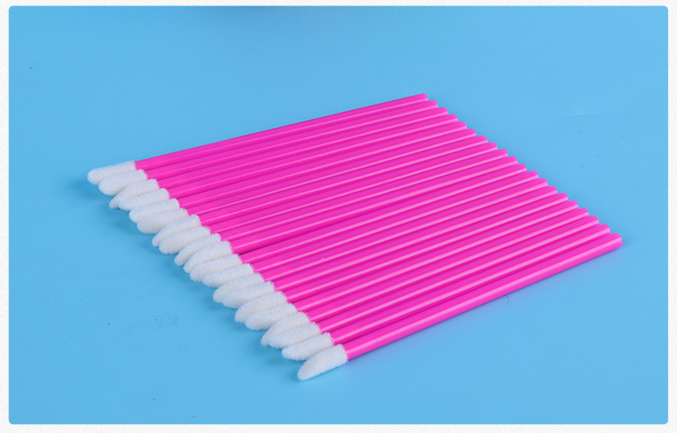 Wegwerp draagbare lippenstift met holle staaf en gevlokte lipglossborstel, schoonheidstool, make-upborstel_voghion.com