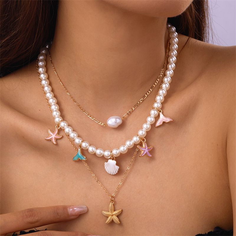 Ensemble de bijoux pour femme : collier multicouche en coquillage, perle et conque, style rétro estival, avec pendentif étoile de mer._voghion.com