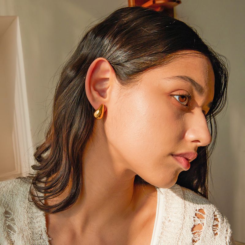 Orecchini da donna in acciaio inossidabile con gocce d'acqua in titanio e oro_voghion.com