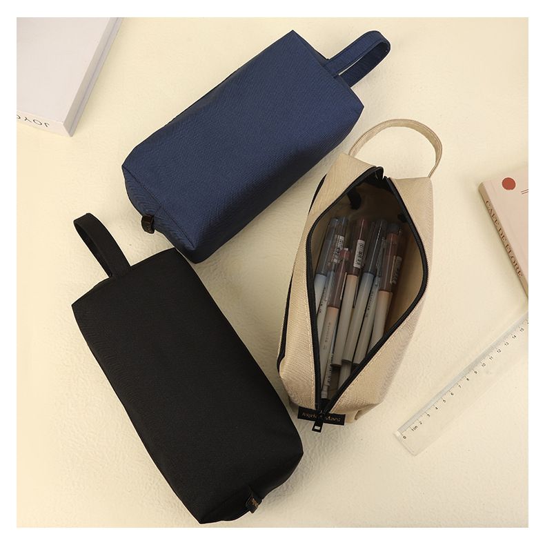 Trousse à crayons transfrontalière de grande capacité en gros trousse de rangement de papeterie pour étudiant de couleur unie trousse à crayons pour étudiant sac de papeterie en tissu Oxford simple_voghion.com