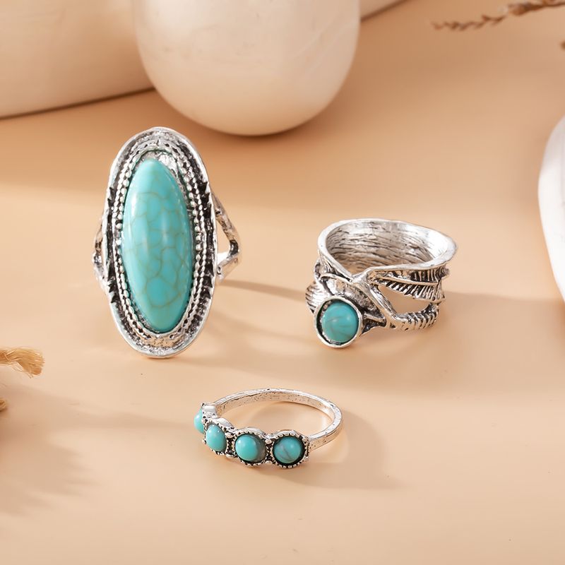Nuovo set di 3 anelli con piume bohémien e turchese grandi_voghion.com