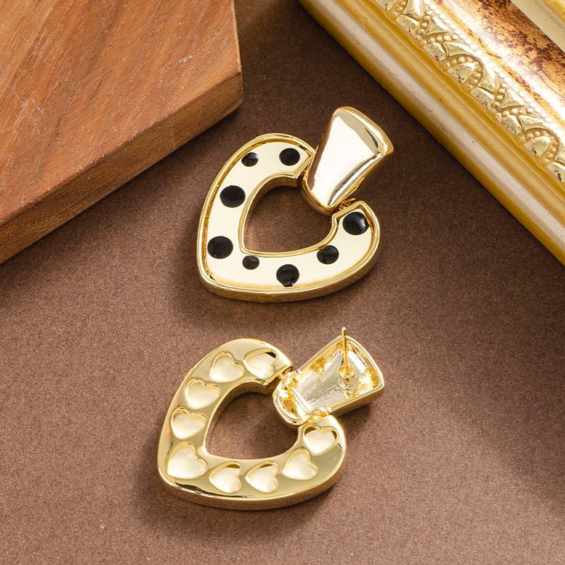 Elegante e raffinato smalto a goccia con pois a forma di cuore, con temperamento femminile, semplice e di alta qualità, in argento._voghion.com