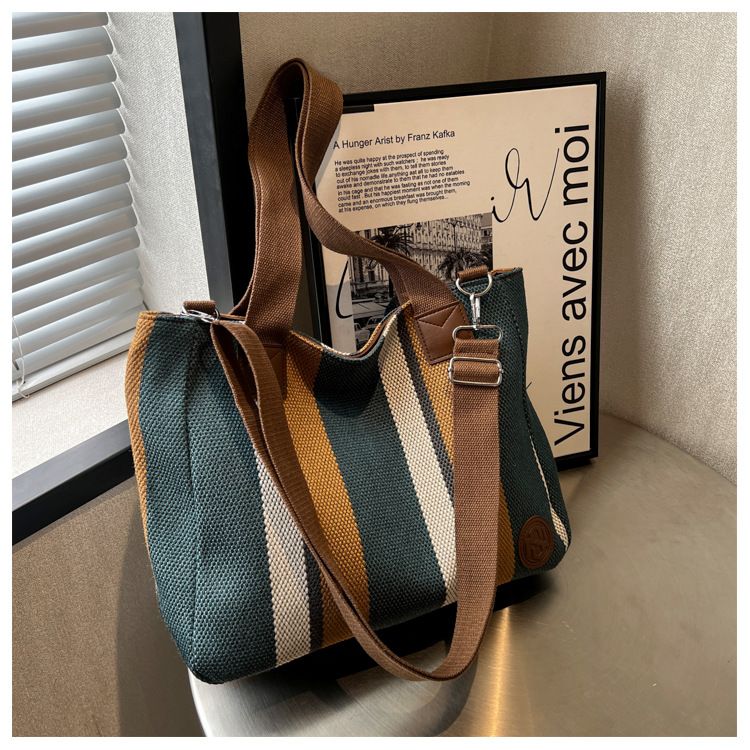 Women's tote with large capacity 2024 new canvas handbag, high-end commuting fashion makeup bag, shoulder bag_voghion.com