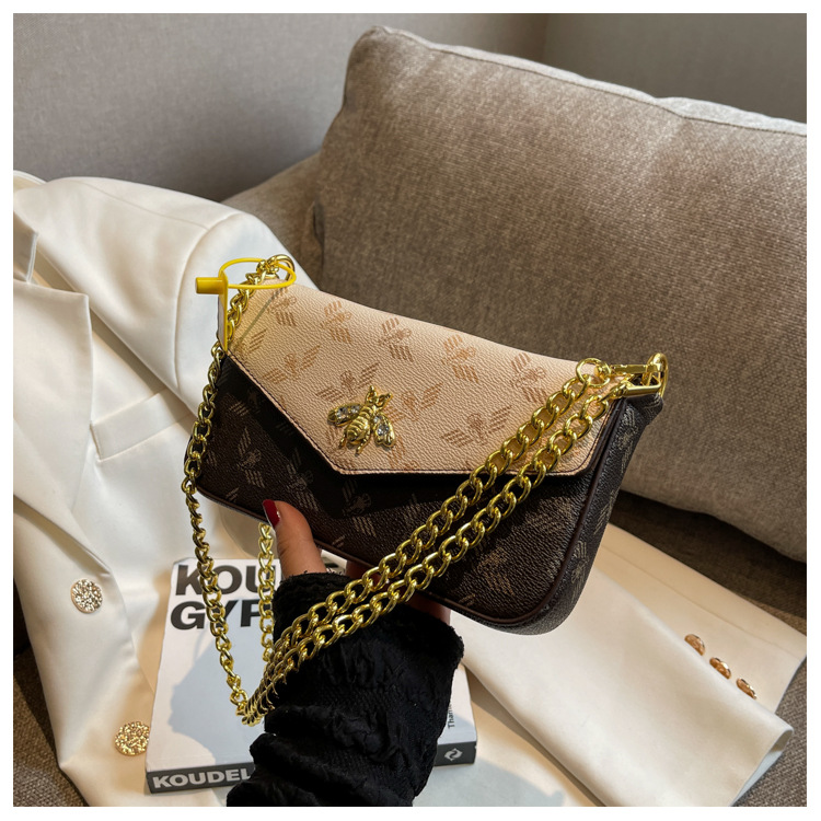 2023 nuova catena di moda singola spalla obliqua straddle piccola borsa versatile borsa a busta retrò piccola borsa quadrata marea_voghion.com