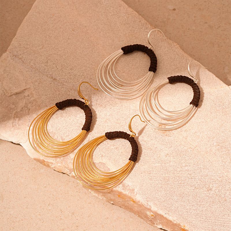 Exaggerated multi-layer circle ear hook personalized fabric winding geometric earrings_voghion.com