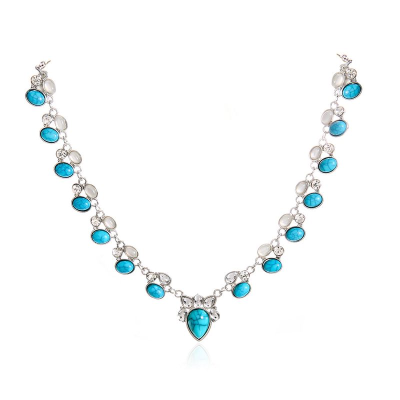Collana con fiore in stile bohémien, gioiello alla moda e unico con intarsi in turchese bianco_voghion.com