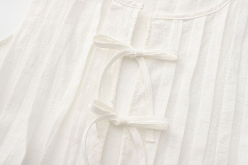Completo da donna europeo e americano, primavera ed estate 2025, in cotone e lino, senza maniche, due pezzi, con camicia e gonna lunga da donna con spalline sottili._voghion.com