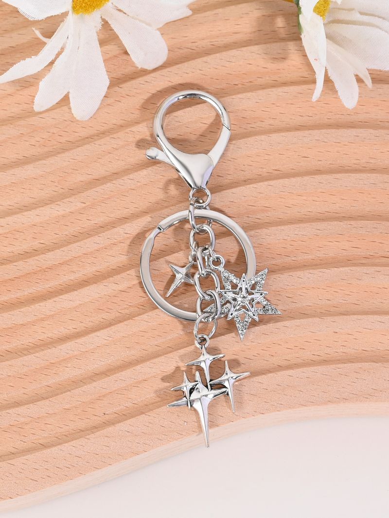 Colgante de llavero para coche con forma de estrella de cuatro puntas, estilo coreano, sencillo, ideal como regalo de San Valentín._voghion.com