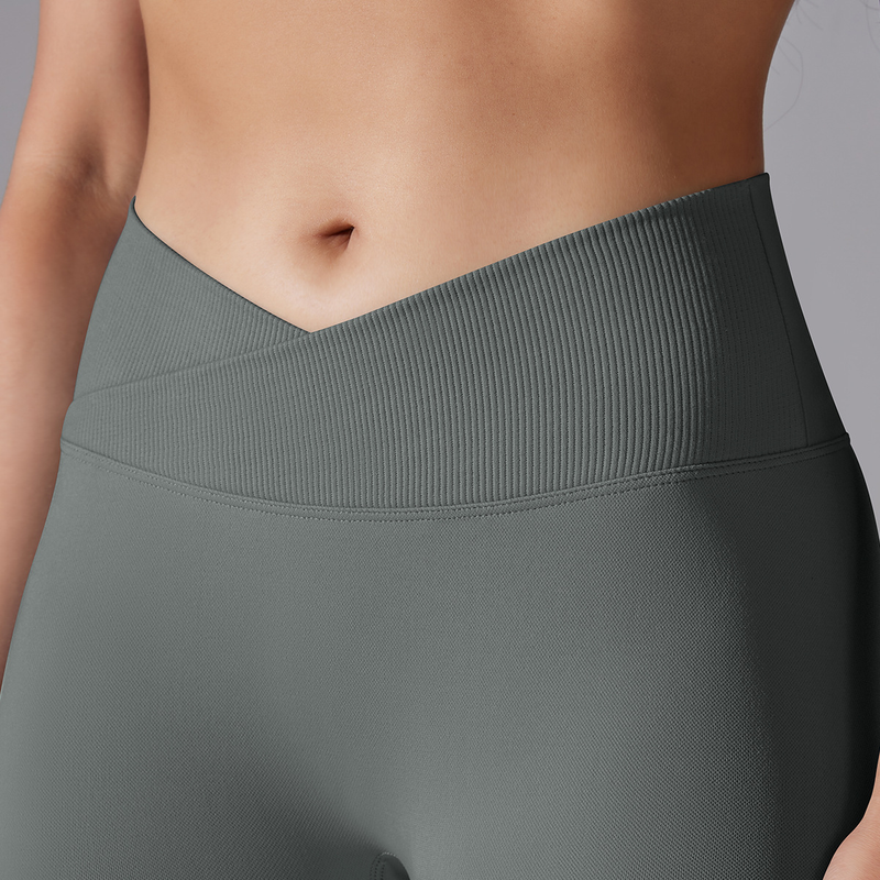 Pantaloni da yoga a nove punti da fitness da donna, lavorati a maglia, traspiranti, in tinta unita, a vita incrociata, color pesca, senza cuciture_voghion.com