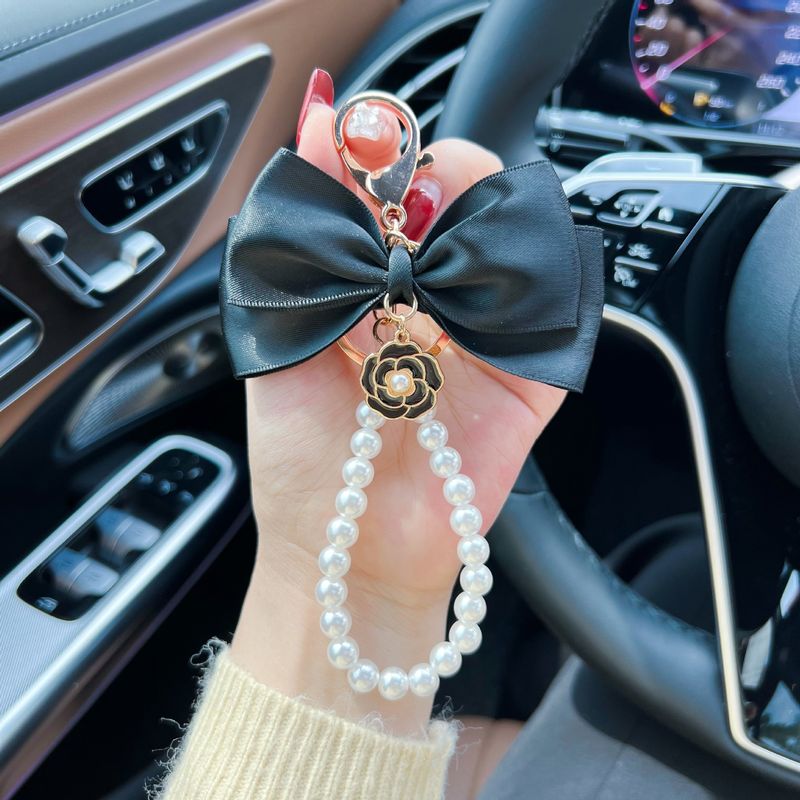 Creative Fashion Bow Camellia Pearl String Car Keychain Women's Bag Pendant Phone Charm_voghion.com