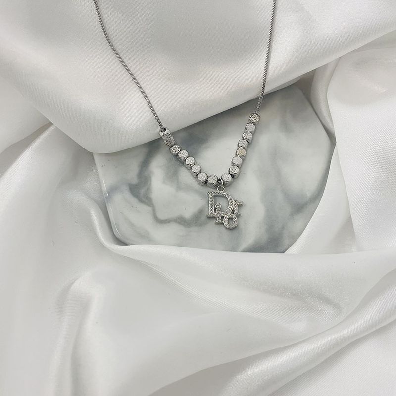 Collana con ciondolo a forma di lettera con strisce di ghiaccio hip hop e zircone in rame, collana con maglione di diamanti con personalità alla moda,_voghion.com