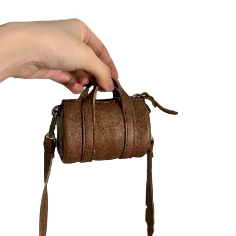 Bolso de hombro cilíndrico de alta gama, estilo nicho, marrón, mini, exquisito, para otoño e invierno, 2025_voghion.com