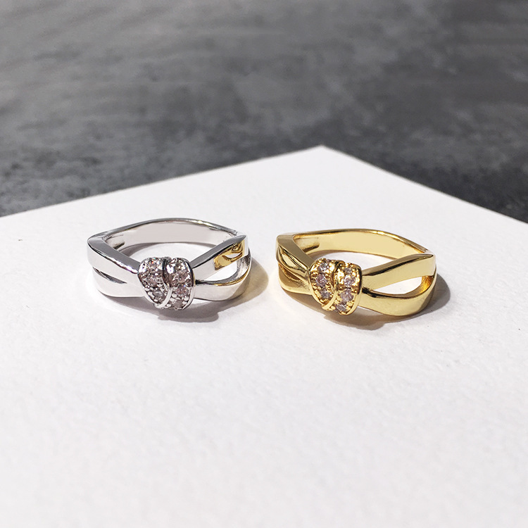 Japanese and Korean style East Gate Fashion and Beautiful Lover Knot Asymmetric Cross Twist Set Diamond Ring_voghion.com