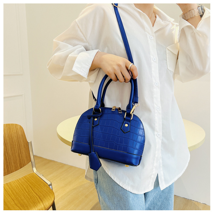 Europeiskt och amerikanskt mode retro stenmönster enkel skalväska 2024 ny nischdesignad axelväska crossbody damväska trend_voghion.com