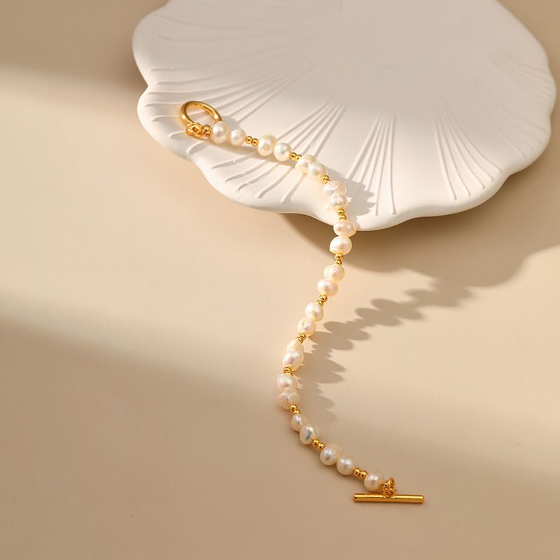 Naturlig ferskvannsperle uregelmessig høykvalitets elegant håndlaget armbånd kobberbelagt K ekte gull OT-spenne søte smykker_voghion.com