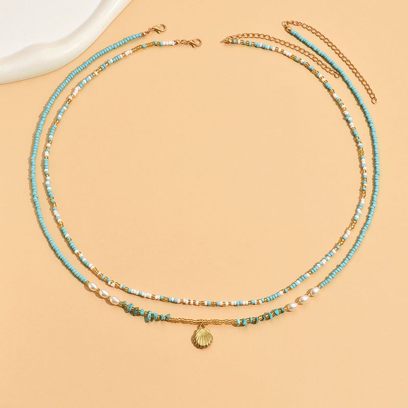 DZ0360 Chaîne de taille simple en perles de riz pour femme, style pastoral créatif_voghion.com