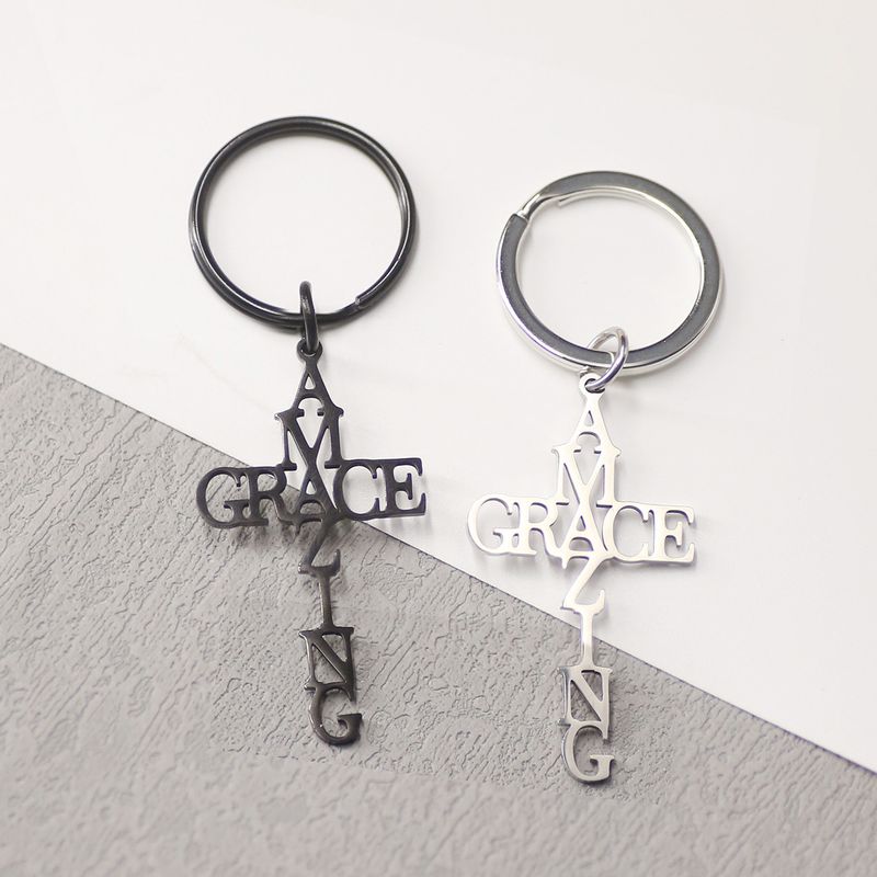 Bogstavet "AMAZING GRACE" kryds i troens navn nøglering herremode enkel nøglering_voghion.com