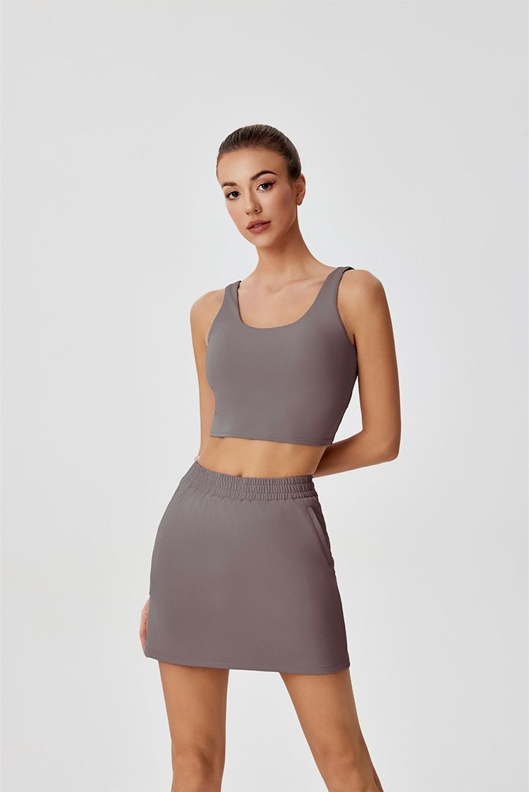 001 Cross-Border New Outdoor Tennis Anti-Exposure Quick-Dry Pocket Half Skirt Hollow Out Backless Sports Vest For Women_voghion.com