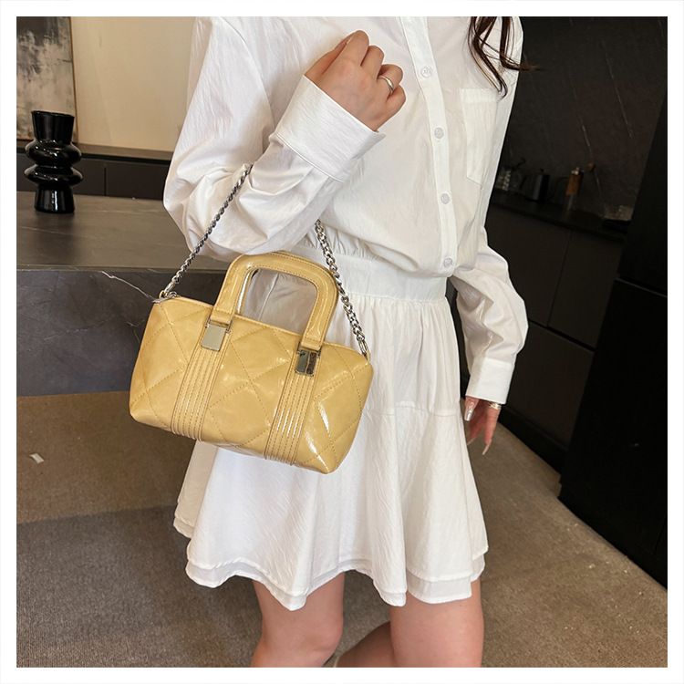 Borsa a mano con catena trapuntata per donna 2025, nuova borsa a secchiello a tracolla semplice, versatile e alla moda_voghion.com