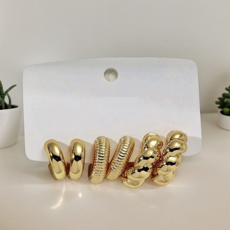 Unisex gold classic fashion personality C shaped twisted water drop shaped women's earrings set_voghion.com