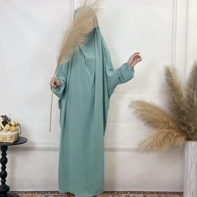 Sieviešu apģērbs Tuvajos Austrumos Dubaijā, malajiešu vienkrāsains, brīvs halāts, plus izmēra sieviešu kleita_voghion.com