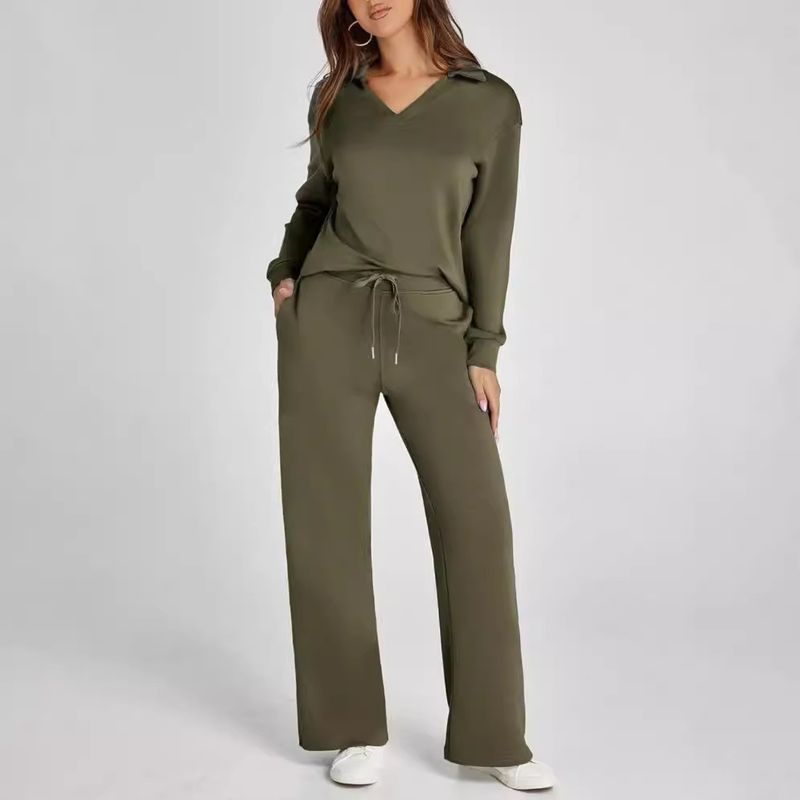Completo due pezzi da donna, top a maniche lunghe con scollo a V e coulisse, elastico in vita e pantaloni svasati._voghion.com