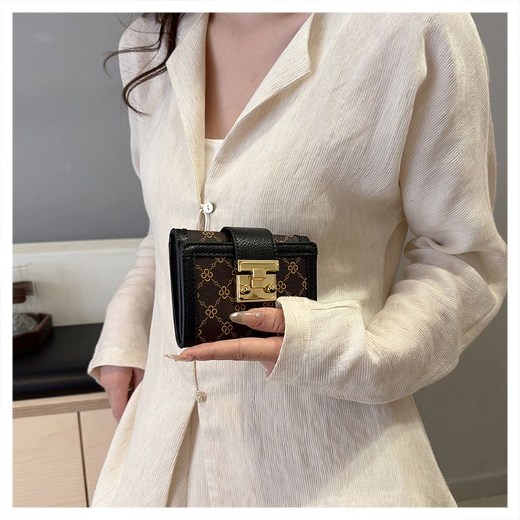 Damentaschen Geldbörse Kartenhalter Boutique Schloss Retro High-End Randdruck Dreifach gefalteter Kartenhalter mit mehreren Positionen Geldbörse mit großer Kapazität_voghion.com