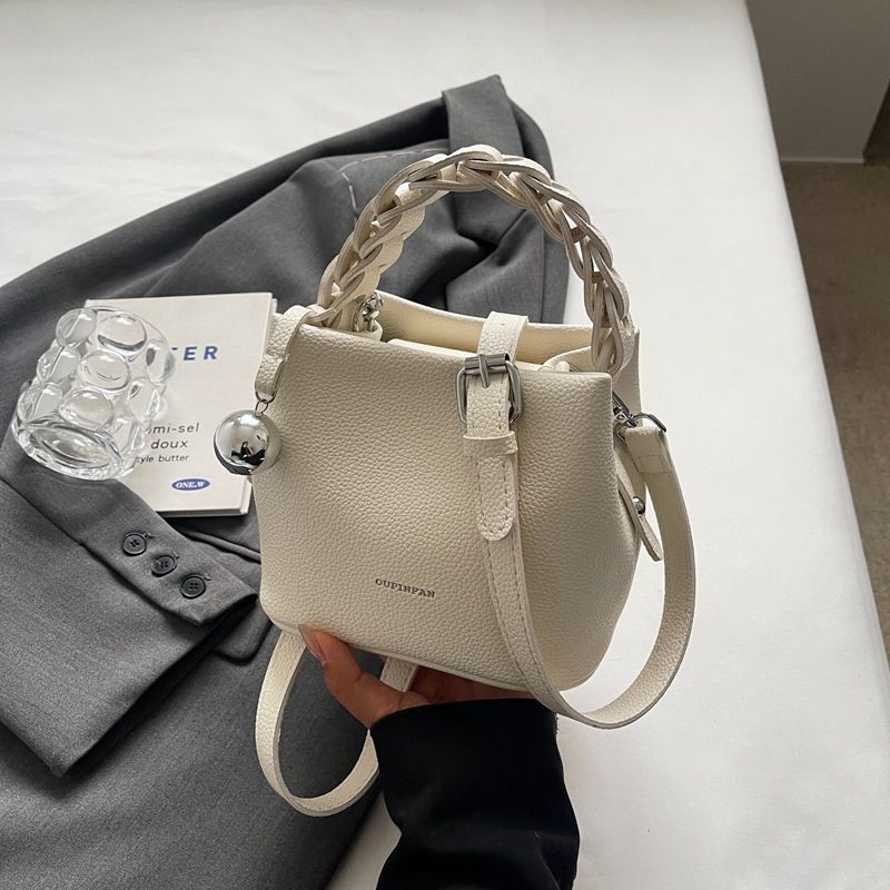 Borsa a tracolla monospalla di grande capacità con motivo litchi in morbida pelle coreana, modello Advanced Weaving Handheld Bucket 2024_voghion.com