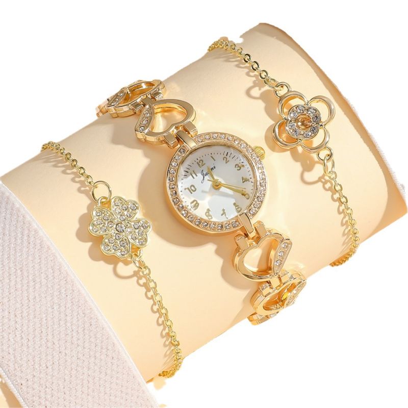 Modisches Set aus herzförmiger, diamantbesetzter Hohluhr und vierblättrigem Kleeblatt_voghion.com