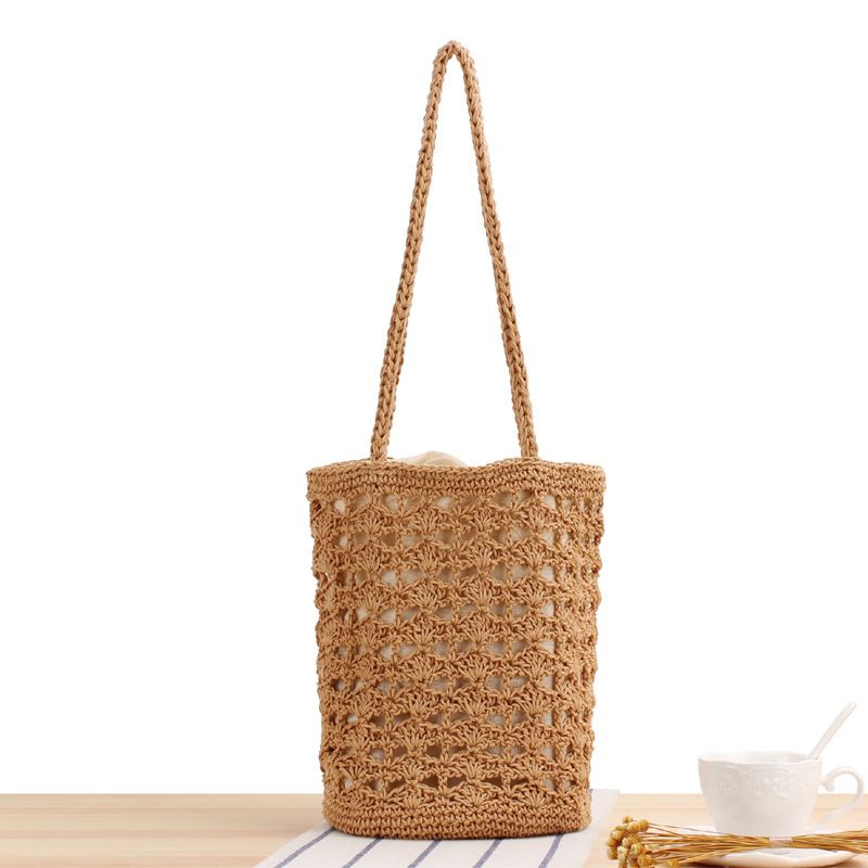 Korean Version Hollowed Out Chic Temperament Cotton Thread Hand Woven Bag Temperament One Shoulder Hand-held Beach Bag_voghion.com
