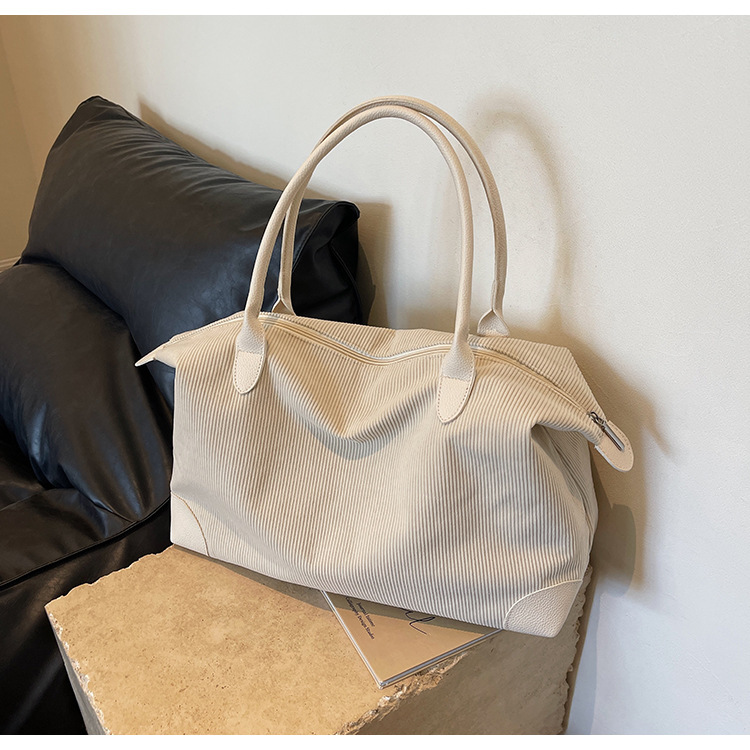 Borsa da viaggio a spalla singola per pendolarismo di grande capacità, design di nicchia, casual e versatile, semplice e alla moda, in velluto a coste, per donna_voghion.com