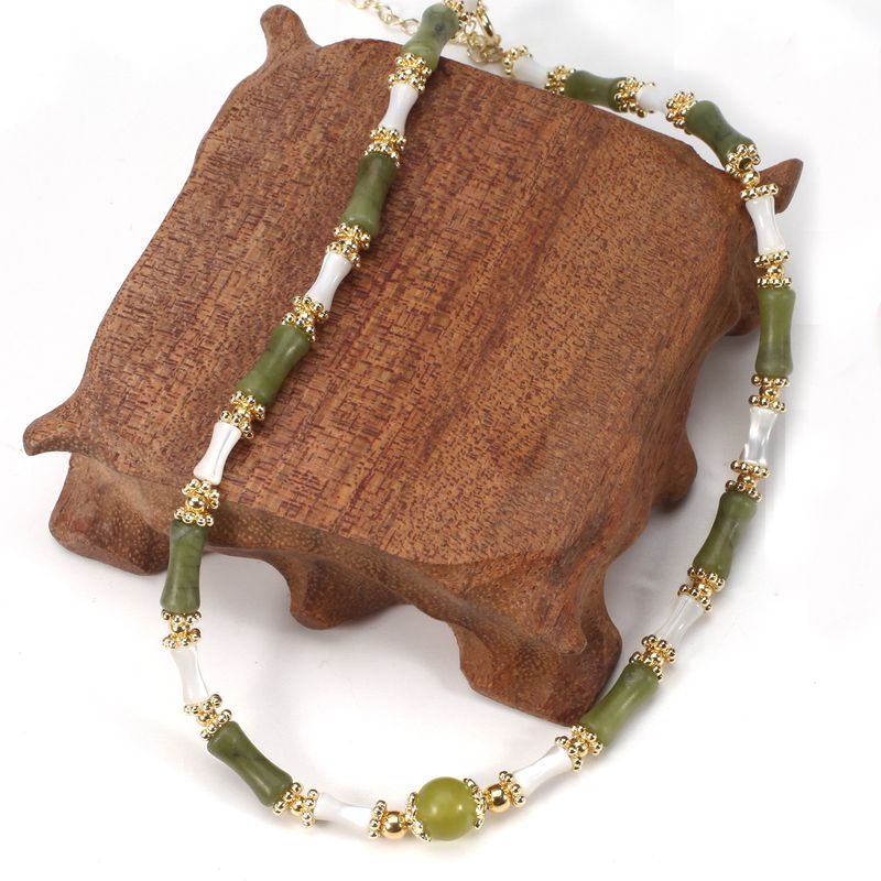 Set di collana con bracciale in pietra naturale con perline rotonde in conchiglia di peridoto di bambù regolabile da donna_voghion.com