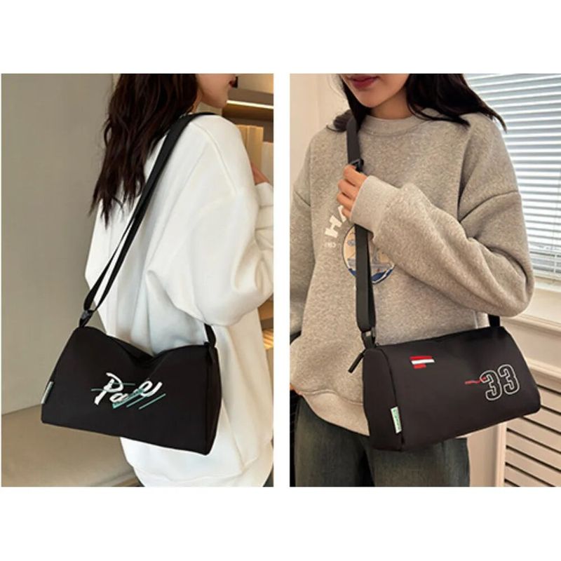2024 New Casual Shoulder Women's Oxford Cloth Large Capacity Lightweight Pillow Black Minimalist Printed Crossbody Bag_voghion.com