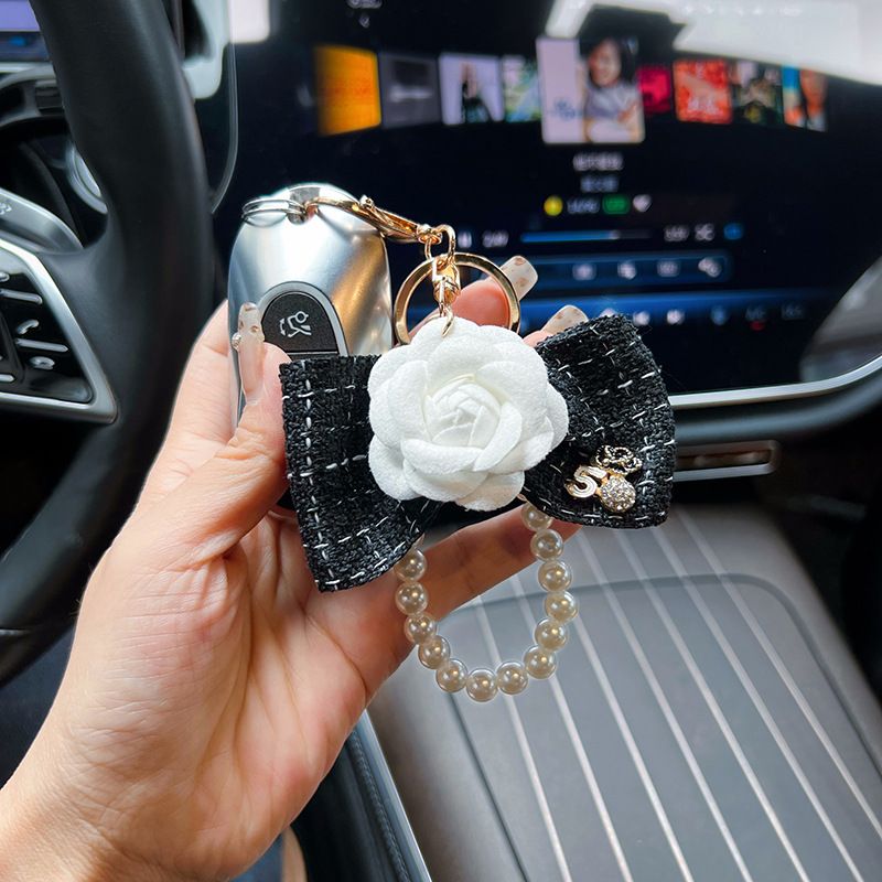 Personalized pearl chain, small fragrance bow, camellia creative and exquisite car keychain, bag decoration, female_voghion.com
