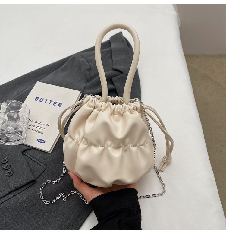Korean high-end soft glutinous cloud bucket bag, niche pleated handbag, cute ins shoulder crossbody bag_voghion.com
