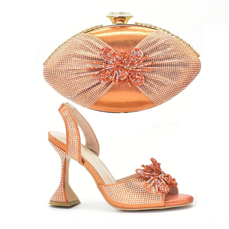 After the party, lace elastic high-heeled sandals with the same color three-dimensional decal clutch set_voghion.com